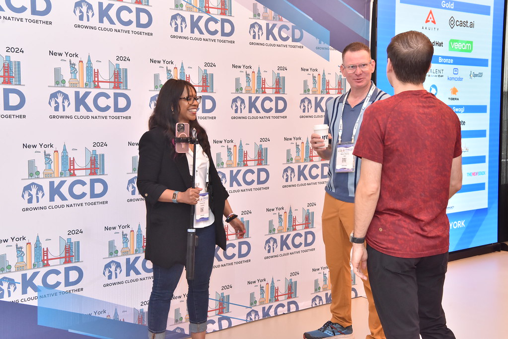 Speaker presenting technical content to audience at KCD New York 2024